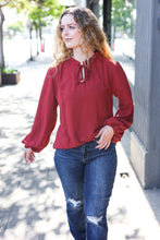 Load image into Gallery viewer, Feeling Femme Off Burgundy Frilled Edge V Neck Tie Top
