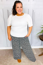 Load image into Gallery viewer, Let&#39;s Meet Up Black Animal Print Smocked Waist Palazzo Pants
